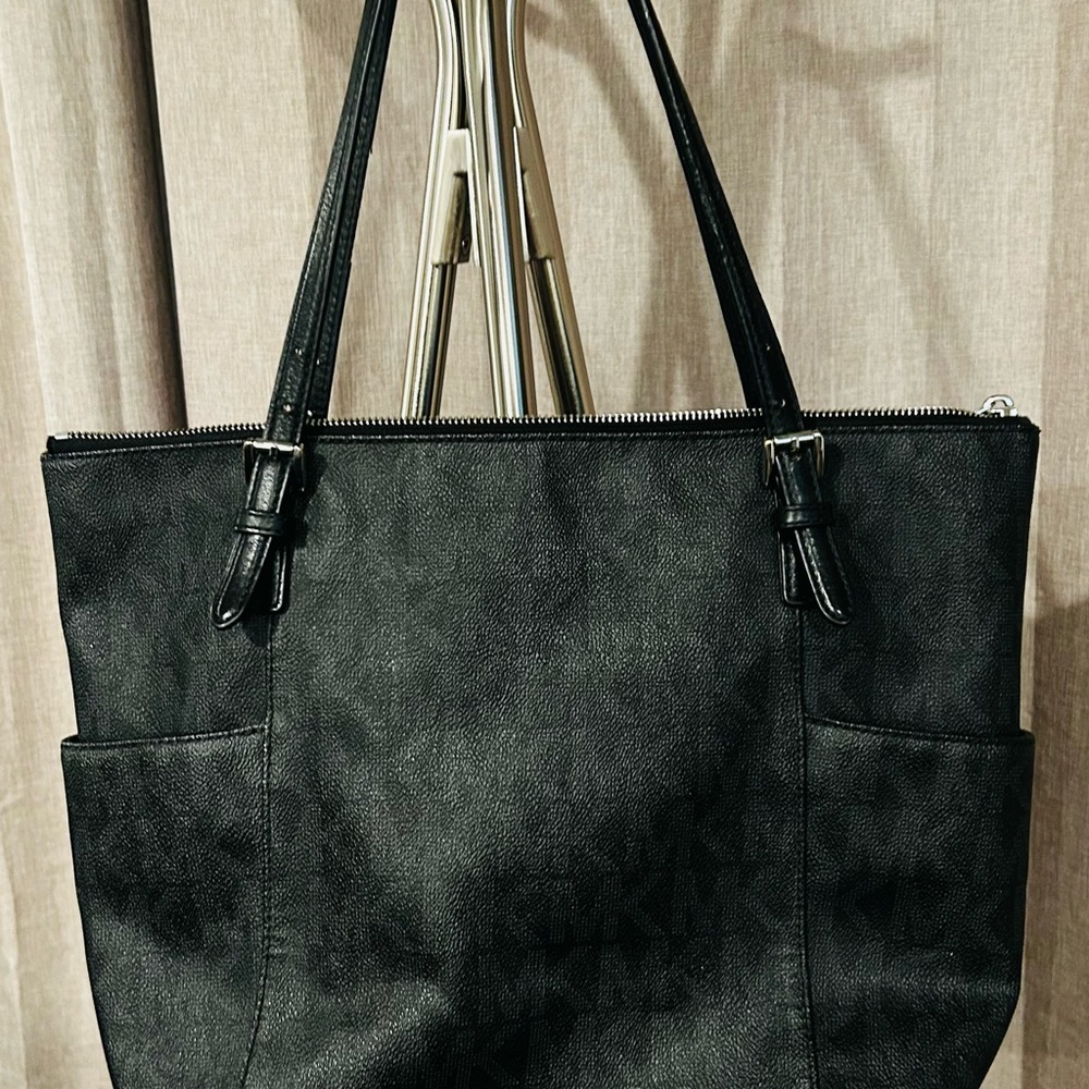 Michael Kors Black‎ Tote Bag with MK logo throughout bag.